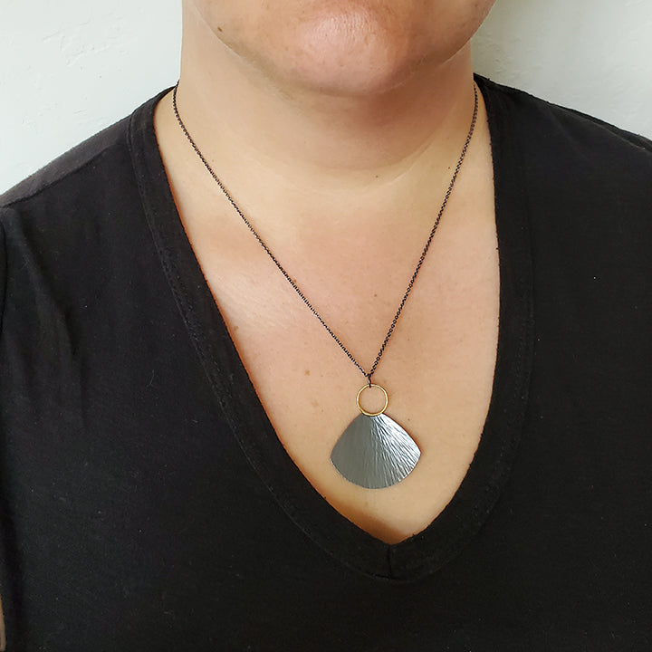 handmade fan shaped necklace oxidized silver and gold textured necklace