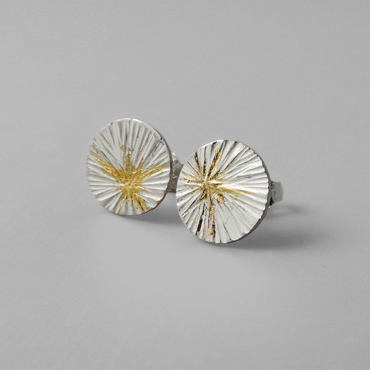 hammered silver round posts with gold details