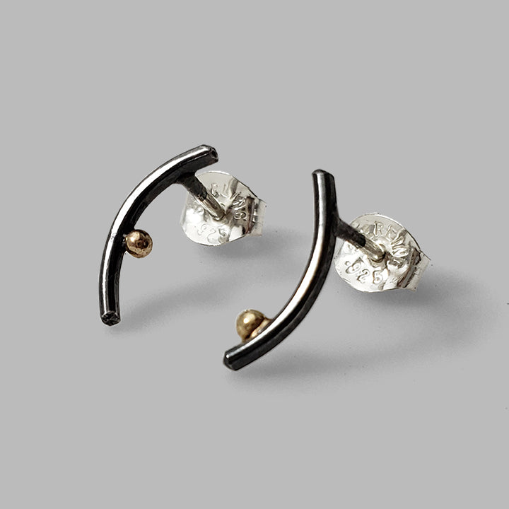 curved oxidized silver bar posts with tiny gold dot