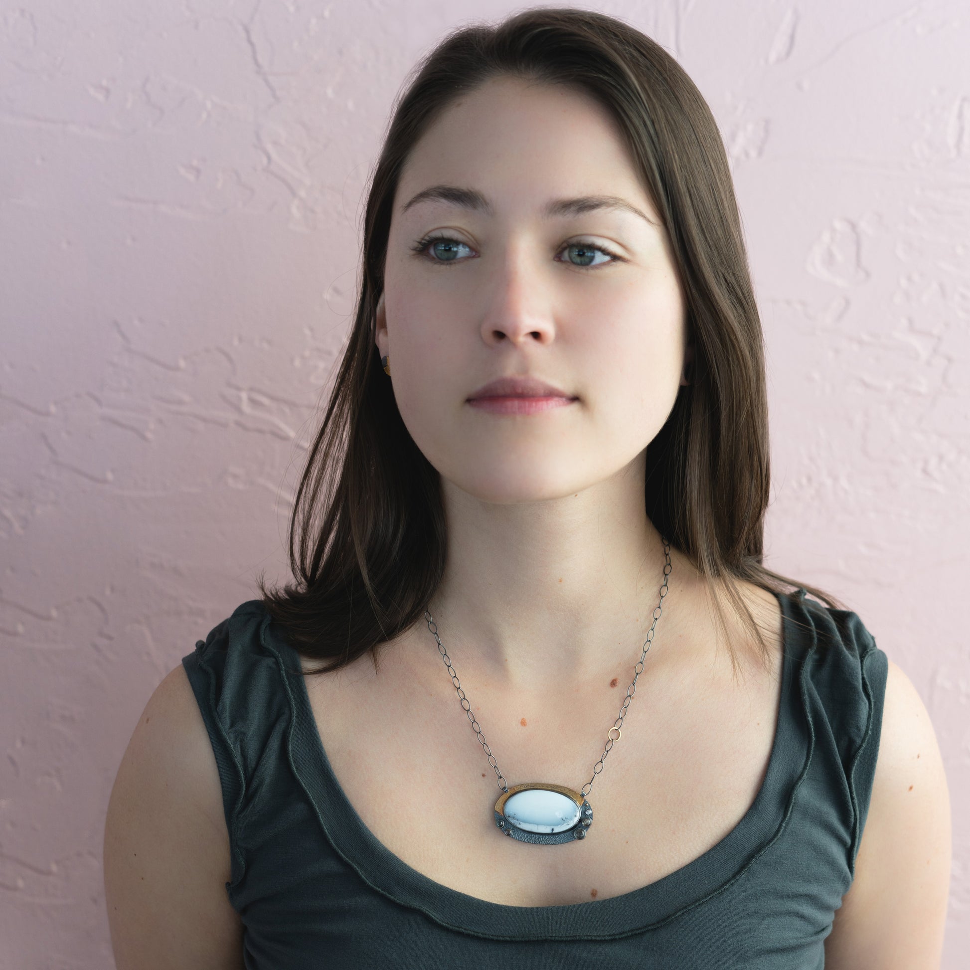 woman wearing handmade artisan jewelry
