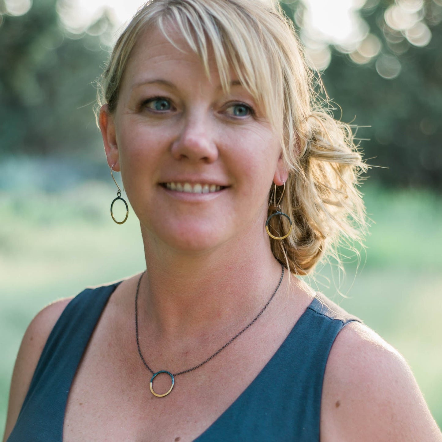 handmade mixed metal hoop necklace and earrings in silver and gold