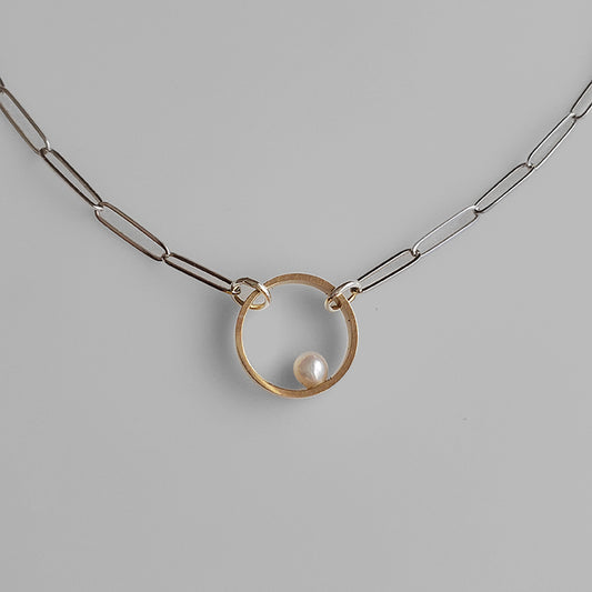 silver linked chain with round gold hoop with fresh water pearl