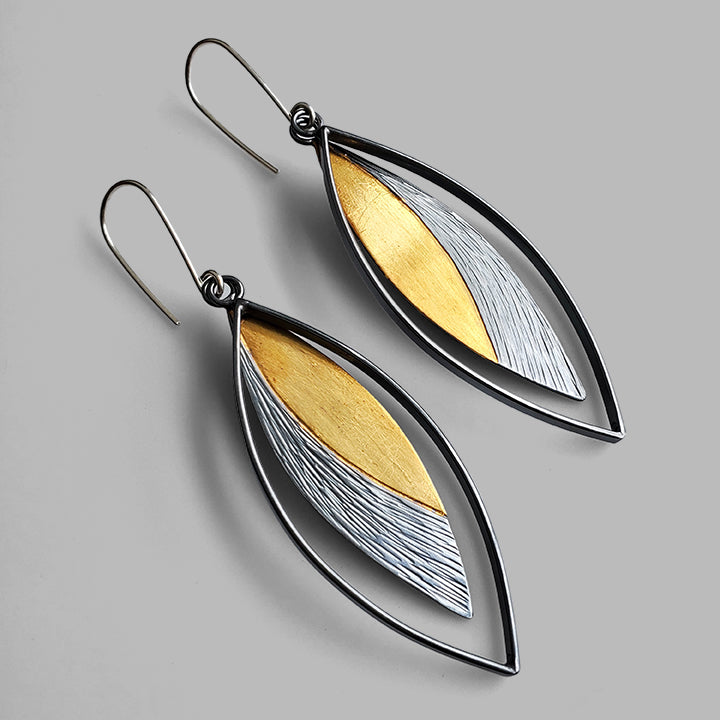 leaf shaped dangle earrings oxidized silver and gold hoops