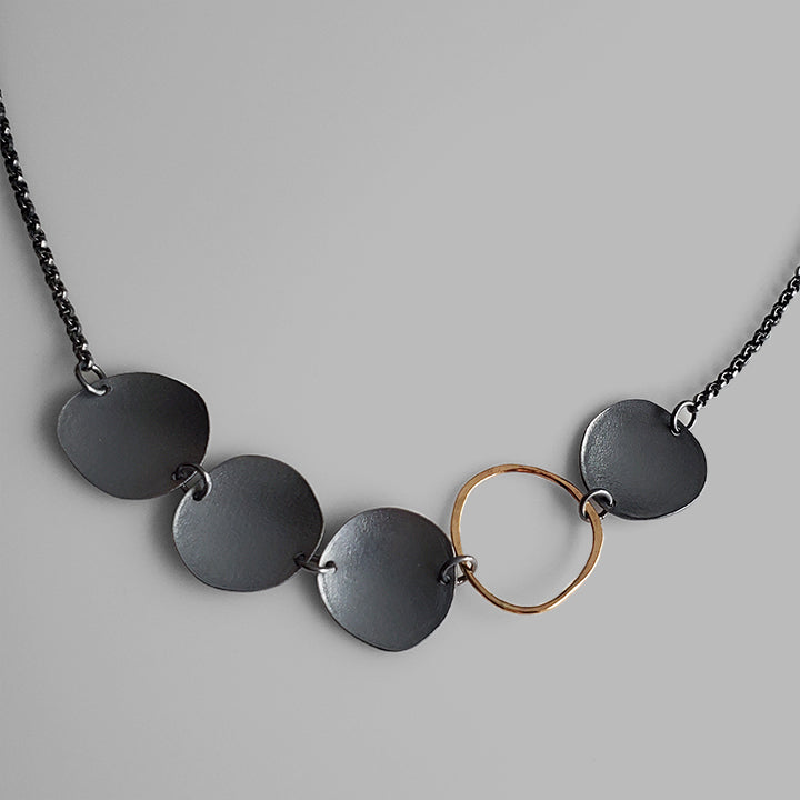 Organic charm necklace oxidized silver and gold choker