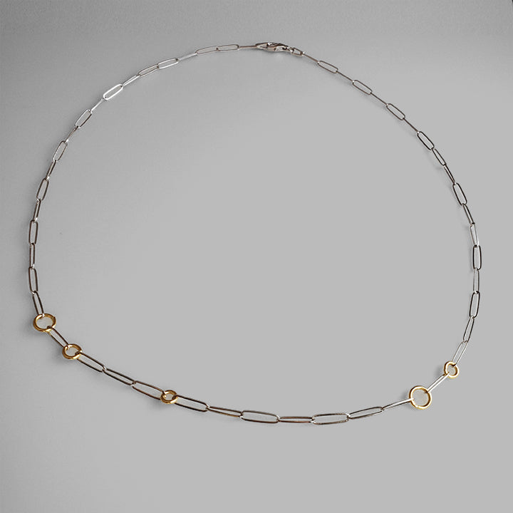 silver linked chain with small gold hoop necklace