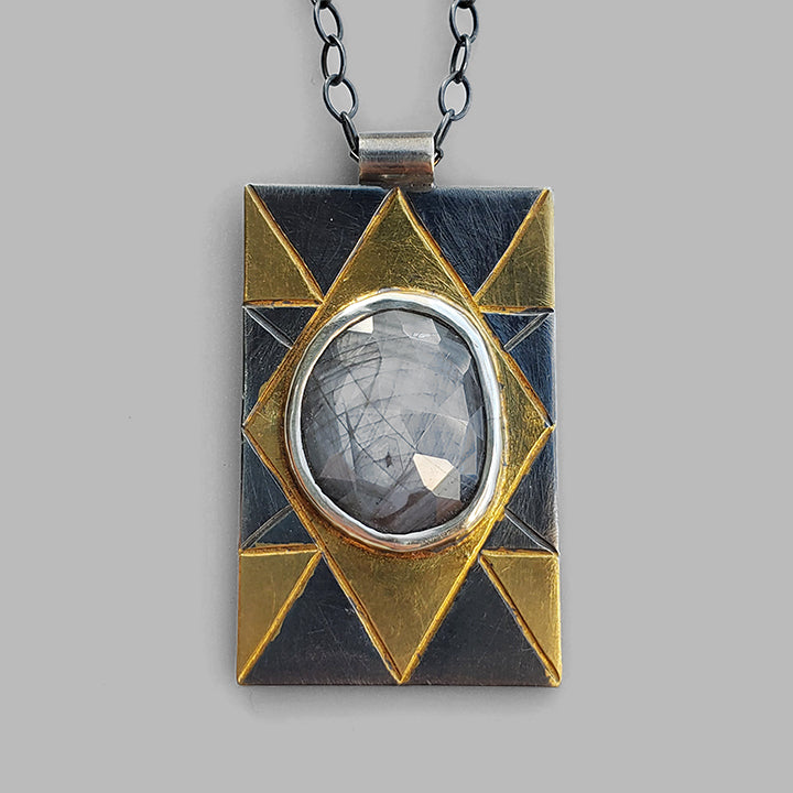 oxidized silver and gold geometric unisex pendant with silver rose cut gemstone