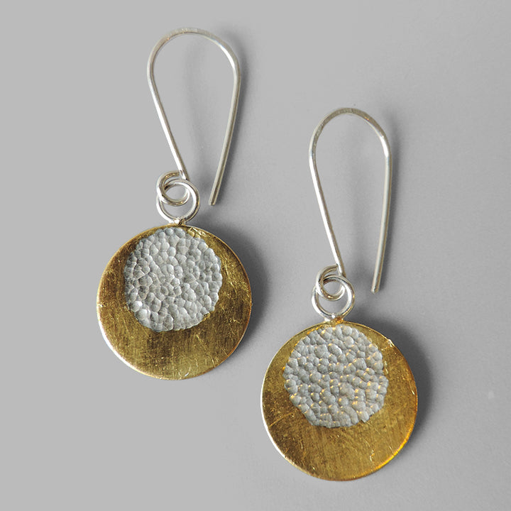 round silver dangles with gold layered around hammered circle