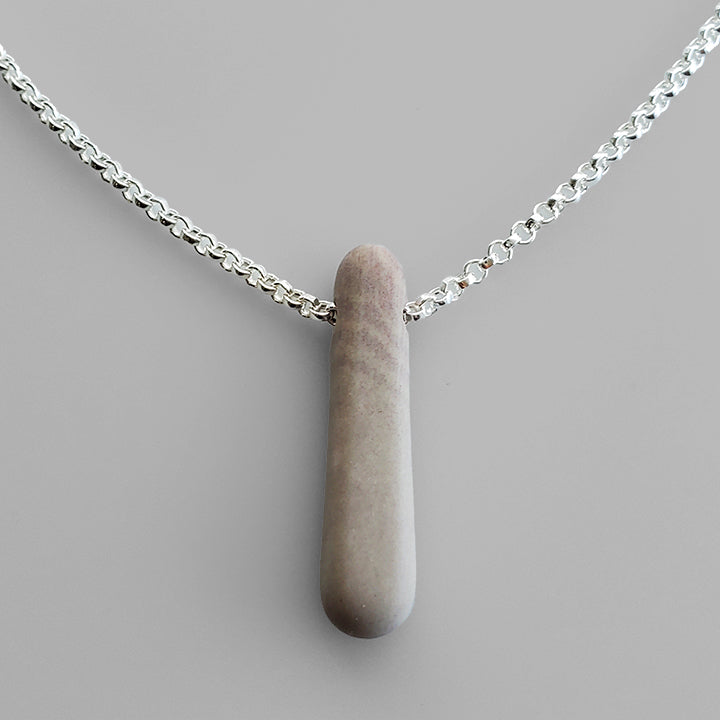 grey pink stick shaped stone on silver chain